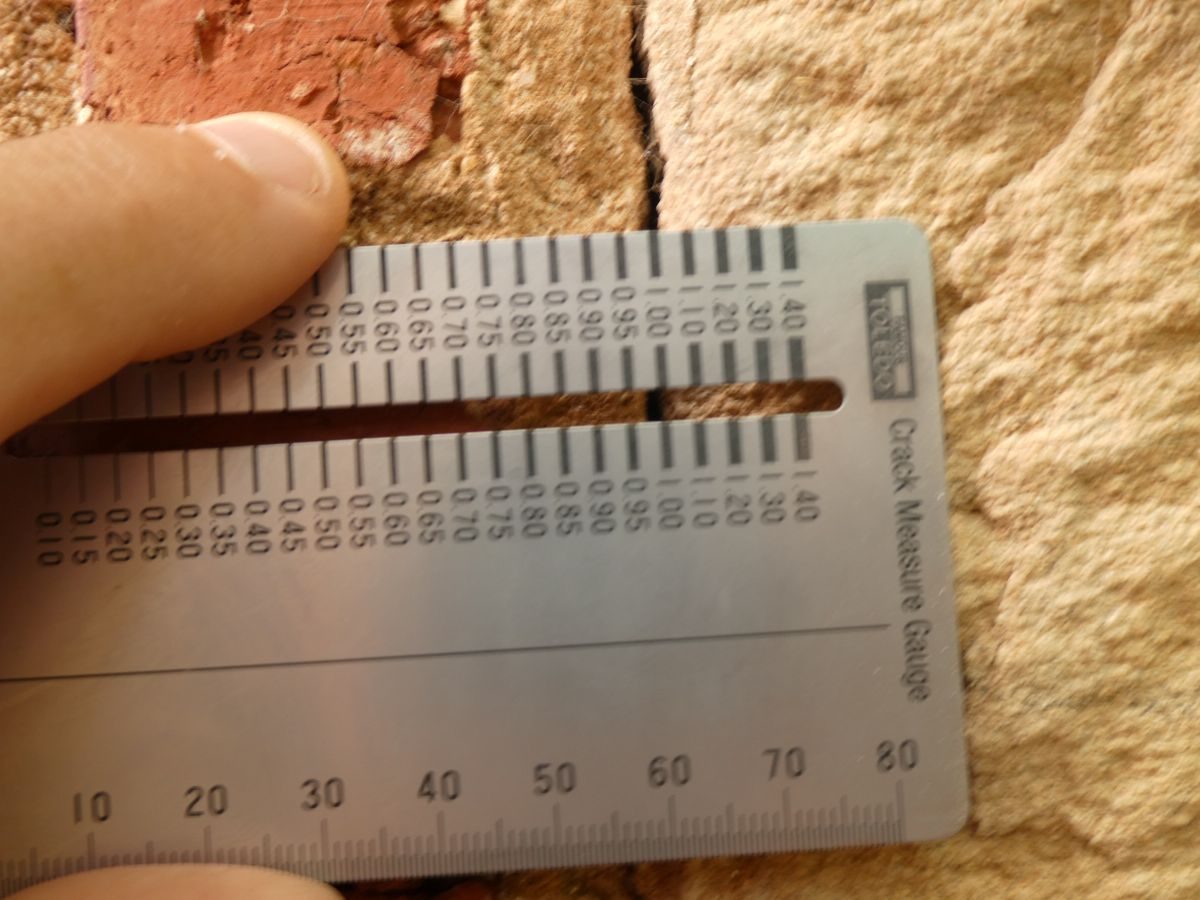 Crack width measured with a gauge on stone masonry at Colonel Light Gardens