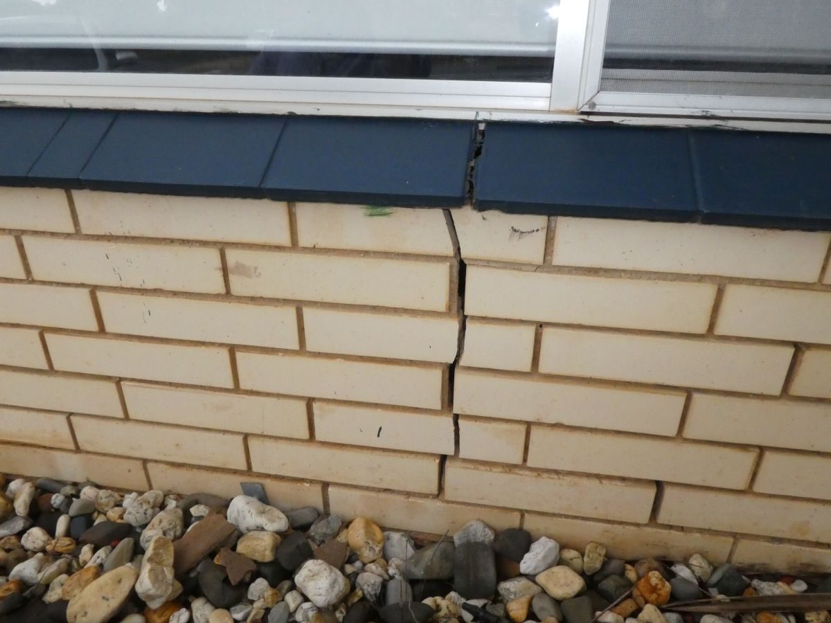 Stepped brick cracking under a window sill at Hallett Cove