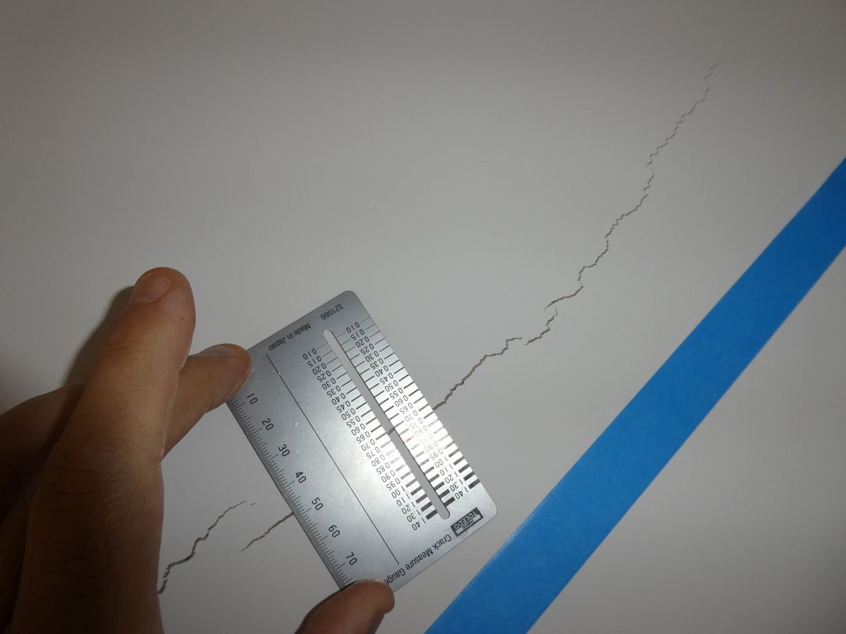 Internal plaster crack measured with a gauge at Murray Bridge