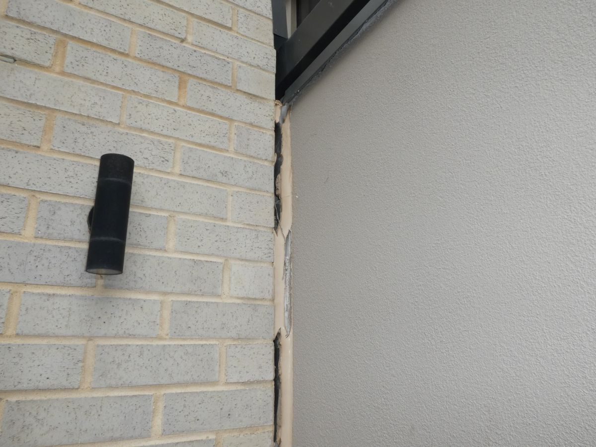 Separation at a brick and render joint in Tranmere