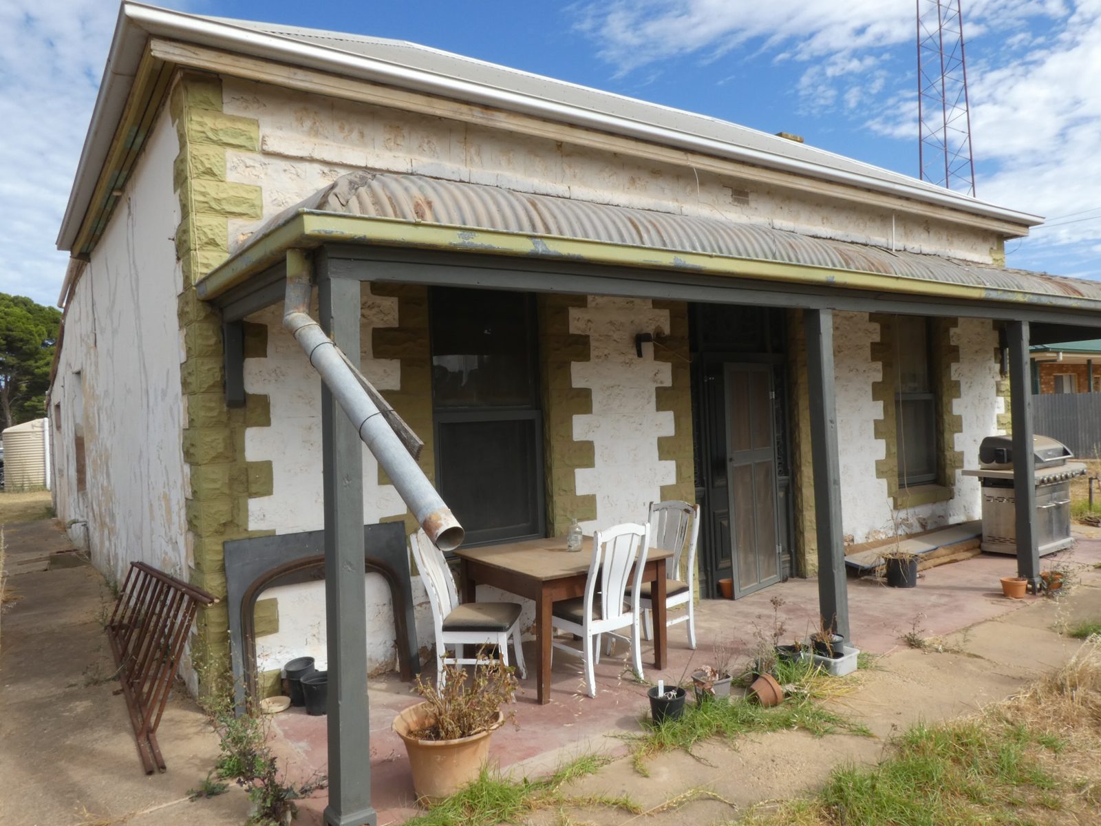 Heritage cottage verandah during a structural inspection at Wallaroo Mines
